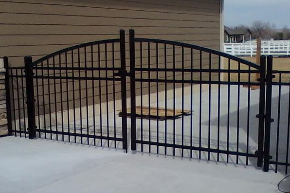 arched iron fence and gate