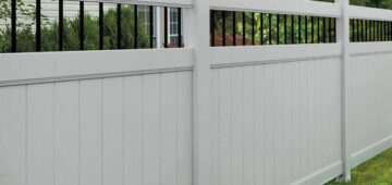 persimmon haven series vinyl fencing in white with iron fencing