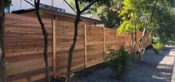 Six foot horizontal wooden fence