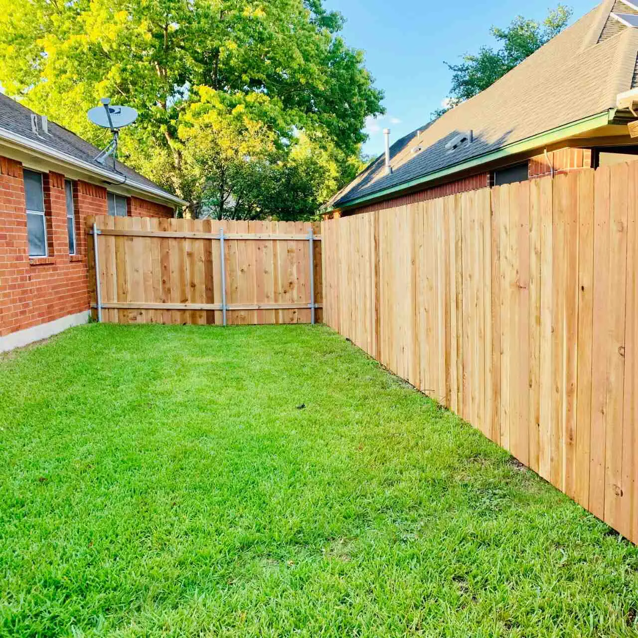 Six foot privacy fence dog ear style with metal posts