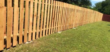 Six foot shadow box fence with two rails