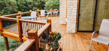 Custom cedar deck with Cedar posts and iron railing