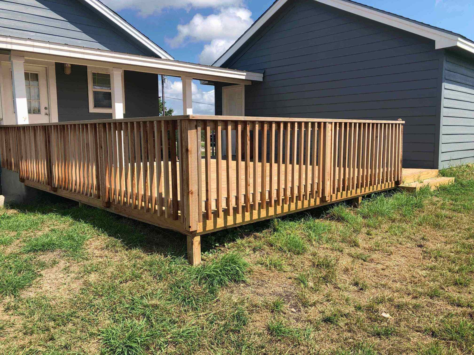 Low profile cedar deck with 2x2 used for railing