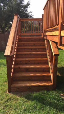 Cedar deck with railing and stairs
