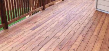 Custom cedar deck with railing and stairs