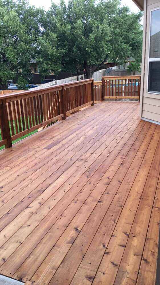 Custom cedar deck with railing and stairs
