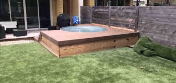 Composite deck built around a cowboy pool and three stairs