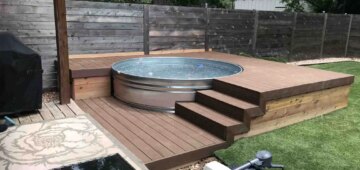 Composite deck built around a cowboy pool and three stairs