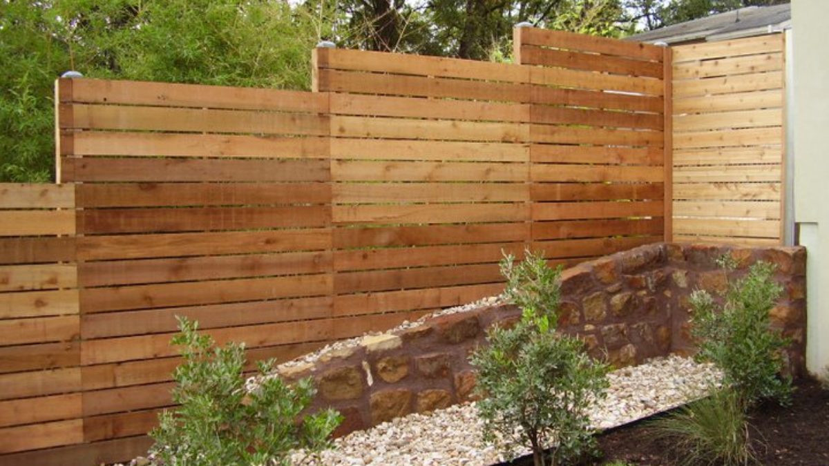21 Fence on Slope Ideas for Your Backyard in 2023
