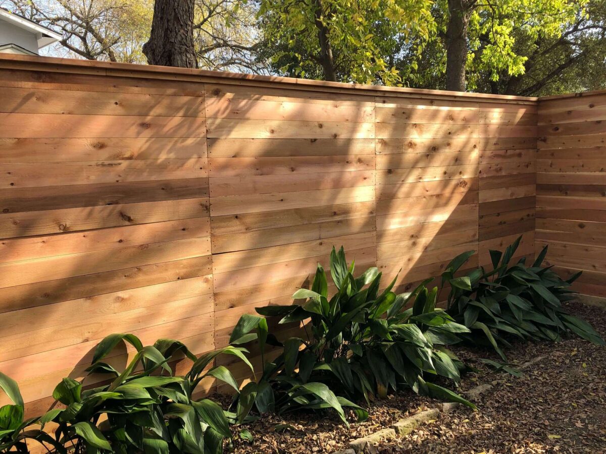 Six foot horizontal fence with cap and trim