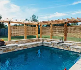 lattice-privacy-fence-with-pergola-surrounding-pool