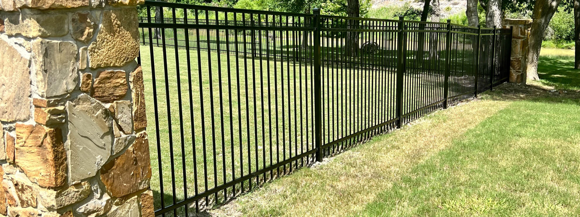 Iron fence on a backyard of a big property in Austin