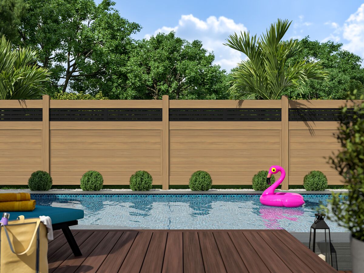 Pepperidge vinyl fence style in cypress, enclosing a backyard with a pool