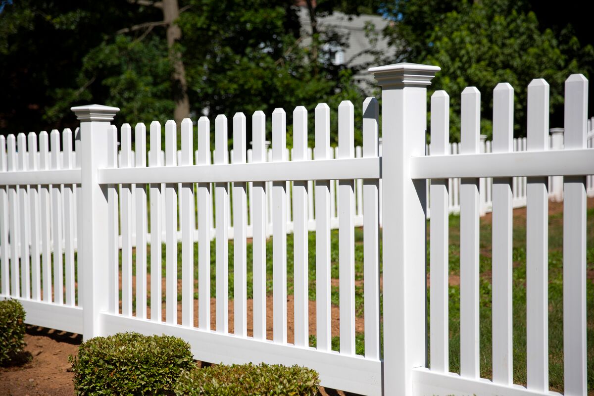 Silverbell vinyl fence, style looks like a traditional white picket fence, enclosing front yard