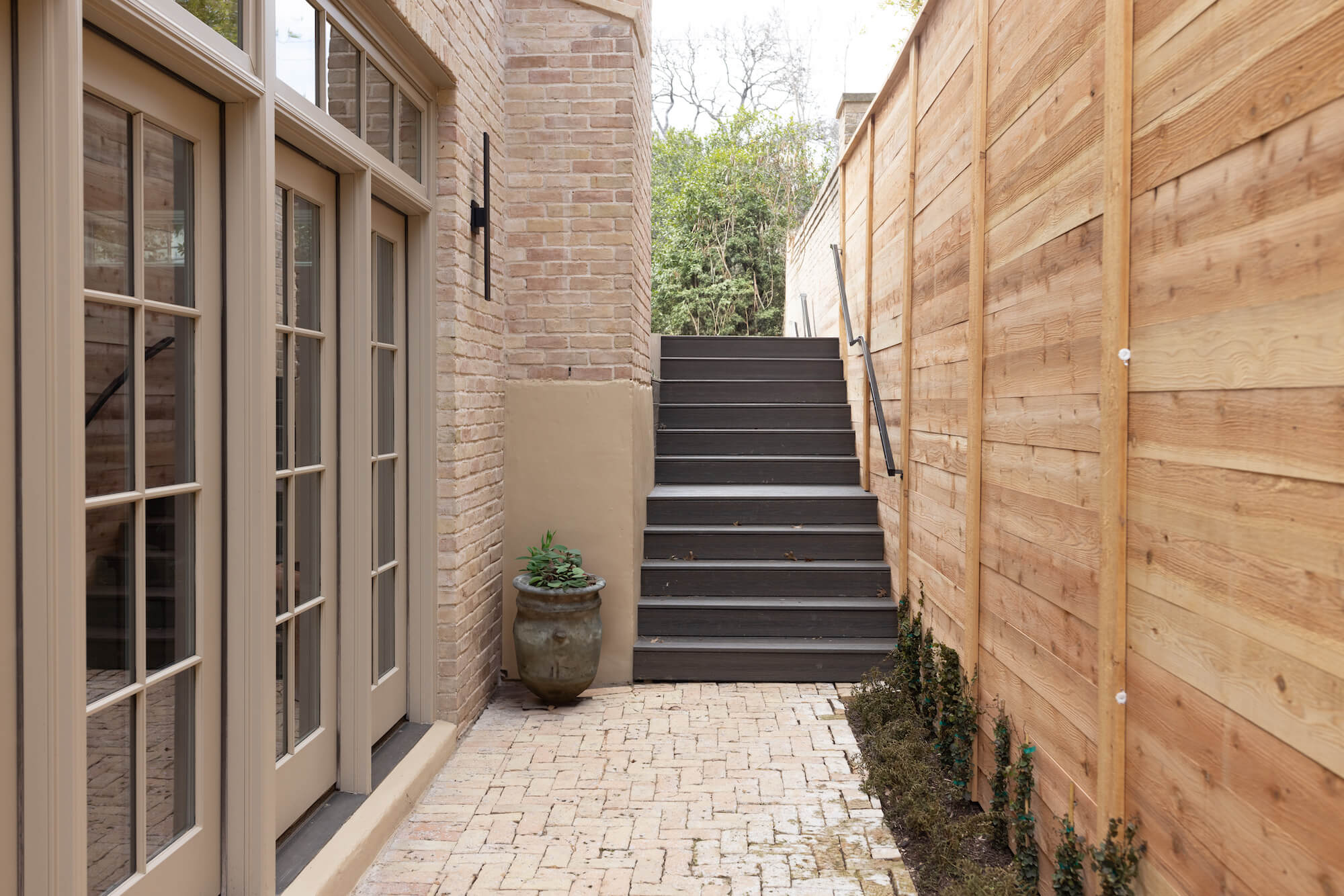 Dark wood stairs to deck in Austin